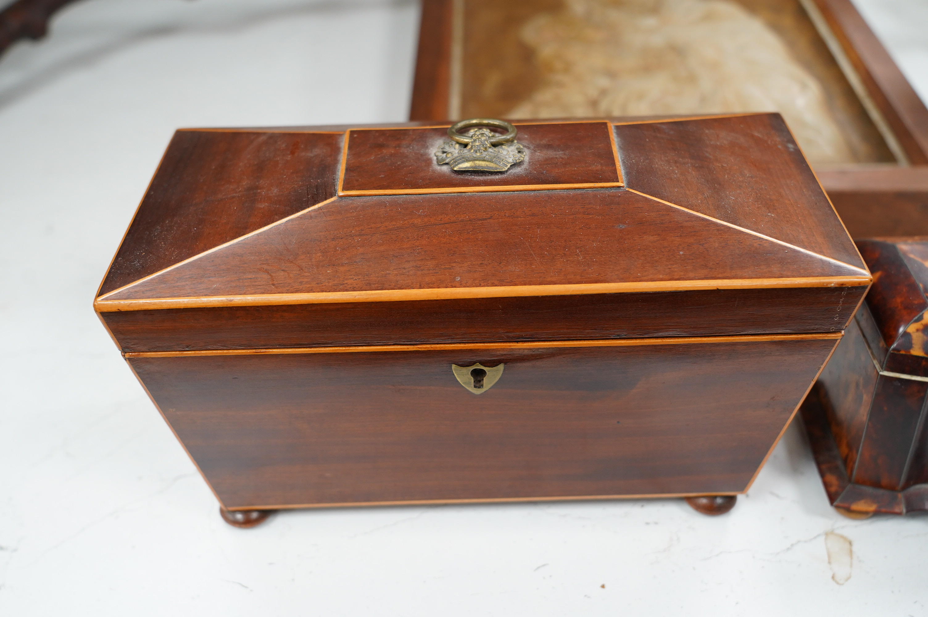 A 19th century tortoiseshell tea caddy with ivory banding together with a satinwood banded mahogany tea caddy, 28cm wide. Condition - poor to fair. CITES Submission reference MTBUUNZA